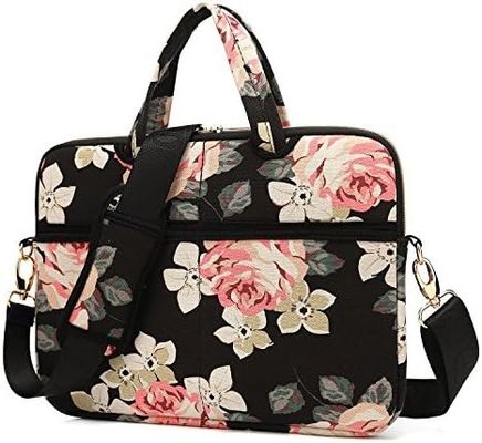 Torba na laptopa przeznaczona dla laptopów o przekątnej od 12,5 do 14 cali, wykonana z wyściełanej wewnętrznej tkaniny płóciennej z nadrukiem i oferująca wiele opcji przenoszenia