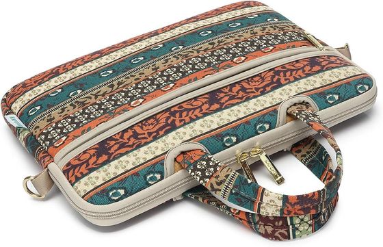 Torba na laptopa przeznaczona dla laptopów o przekątnej od 12,5 do 14 cali, wykonana z wyściełanej wewnętrznej tkaniny płóciennej z nadrukiem i oferująca wiele opcji przenoszenia