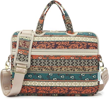 Torba na laptopa przeznaczona dla laptopów o przekątnej od 12,5 do 14 cali, wykonana z wyściełanej wewnętrznej tkaniny płóciennej z nadrukiem i oferująca wiele opcji przenoszenia