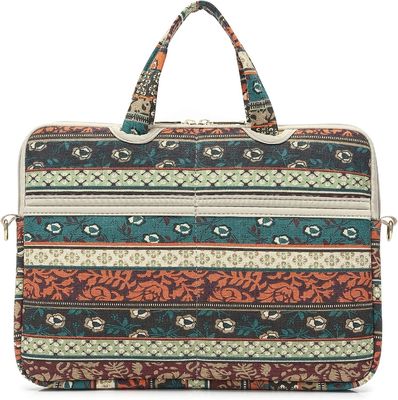 Torba na laptopa przeznaczona dla laptopów o przekątnej od 12,5 do 14 cali, wykonana z wyściełanej wewnętrznej tkaniny płóciennej z nadrukiem i oferująca wiele opcji przenoszenia