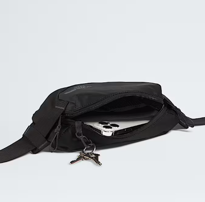 Adjustable webbing strap allows for a waist or crossbody carry Fanny bag